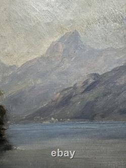 Château romantique au bord d'un lac alpin huile sur toile paysage ancien