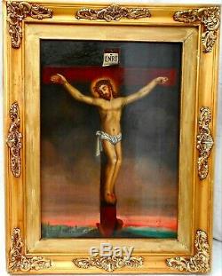 Christ en croix Peinture ancienne huile sur bois Non-signé Cadre doré 92 x 72 cm