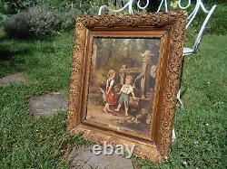 Grand tableau ancien huile / toile enfants puit fontaine signé Doria cadre doré