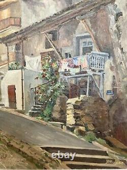 Huile sur toile ancienne H. Huyard rue de village fleurie